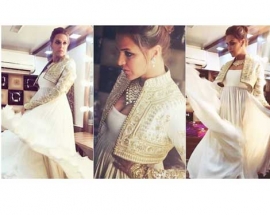 Neha Dhupia gives us another reason to crush on white in this Rohit Bal jacket