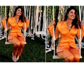 Priyanka Chopra`s tangerine power suit is the brightest formal wear you`ll see..