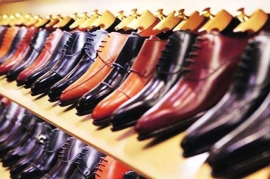 Why is India lagging behind China in footwear production?