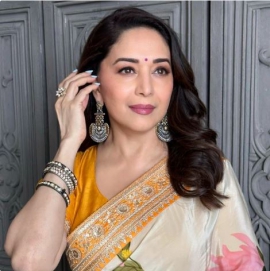 Madhuri Dixit in a House of Masaba saree shows how to catch up with Summer florals in style