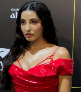 Nora Fatehi in a bold red Nicolas Jebran latex gown puts the word party on our minds