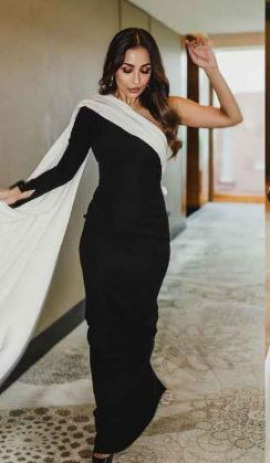 Malaika Arora redefines elegance in Gaffe’s black and white floor-length gown with an asymmetrical cape
