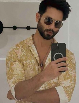 Shahid Kapoor adds a fusion twist to Anita Dongre’s mustard malhar kurta with white pants and formal shoes