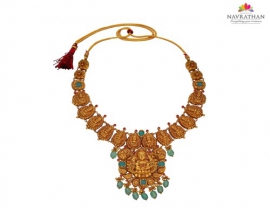 Explore the traditional Goddess Lakshmi necklace collection with Navrathan Jewellers.