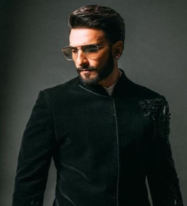 Ranveer Singh sets the bar high for groom styling with his black traditional wear and luxurious accessories