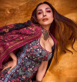 Malaika Arora is TOO HOT TO HANDLE in Anita Dongre’s embroidered dress with a wilderness-inspired jacket