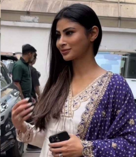 Mouni Roy takes a break from her regular going-out fits for white suit with worked-up purple dupatta