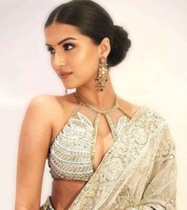 Tara Sutaria`s embellished ivory saree with backless blouse is the perfect team bride staple