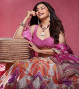 Madhuri Dixit’s colorful lehenga is making our hearts go Dhak Dhak with excitement